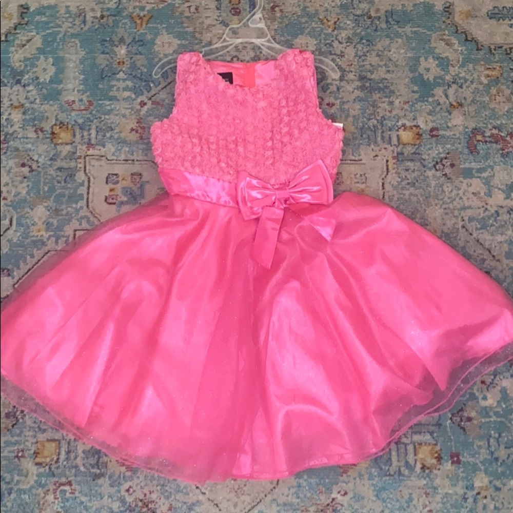 A pink formal kids dress